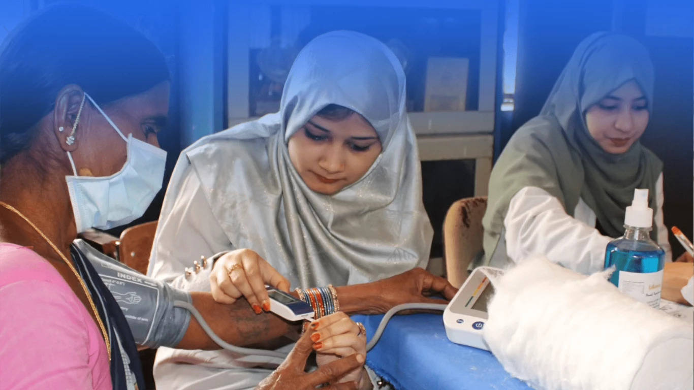 Volunteers distributing food and educational supplies to underserved families and children in India through IMRC programs