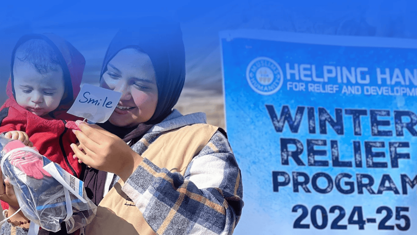 HHRD volunteers distributing food and relief supplies to families in need in a disaster affected community
