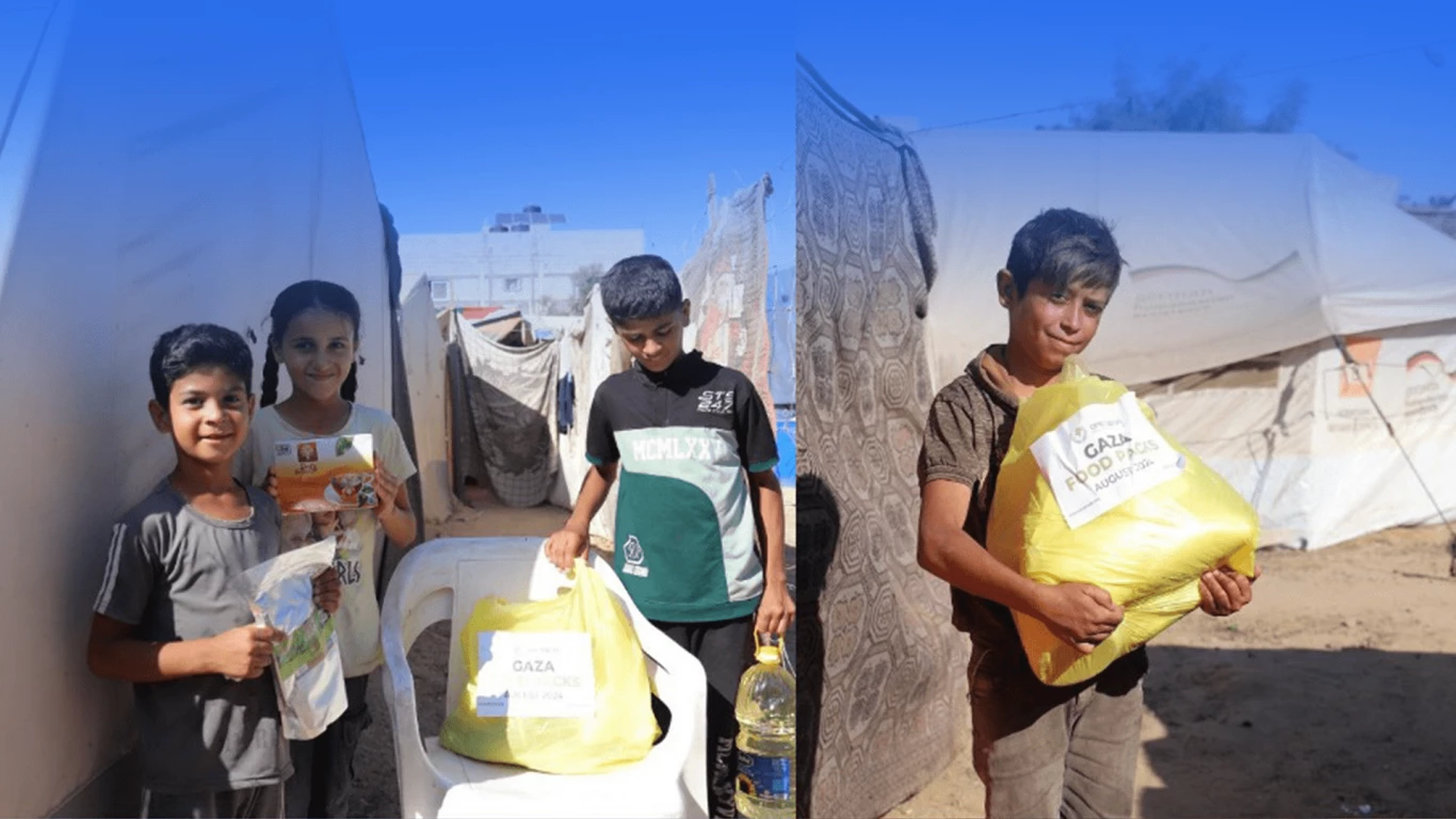 Volunteers distributing food and relief supplies to families affected by disaster through One Nation humanitarian programs